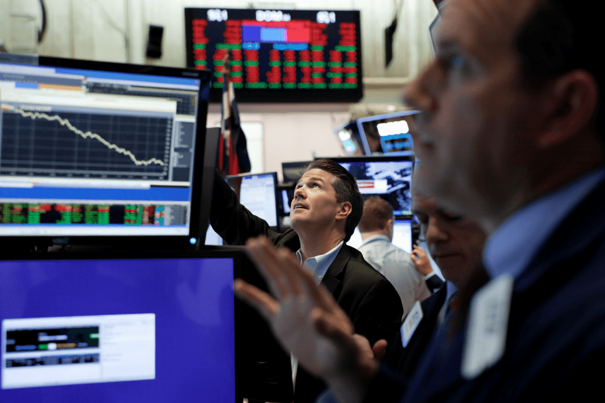 Stock market awaits Fed decision as Dow hits record, tech stocks slip