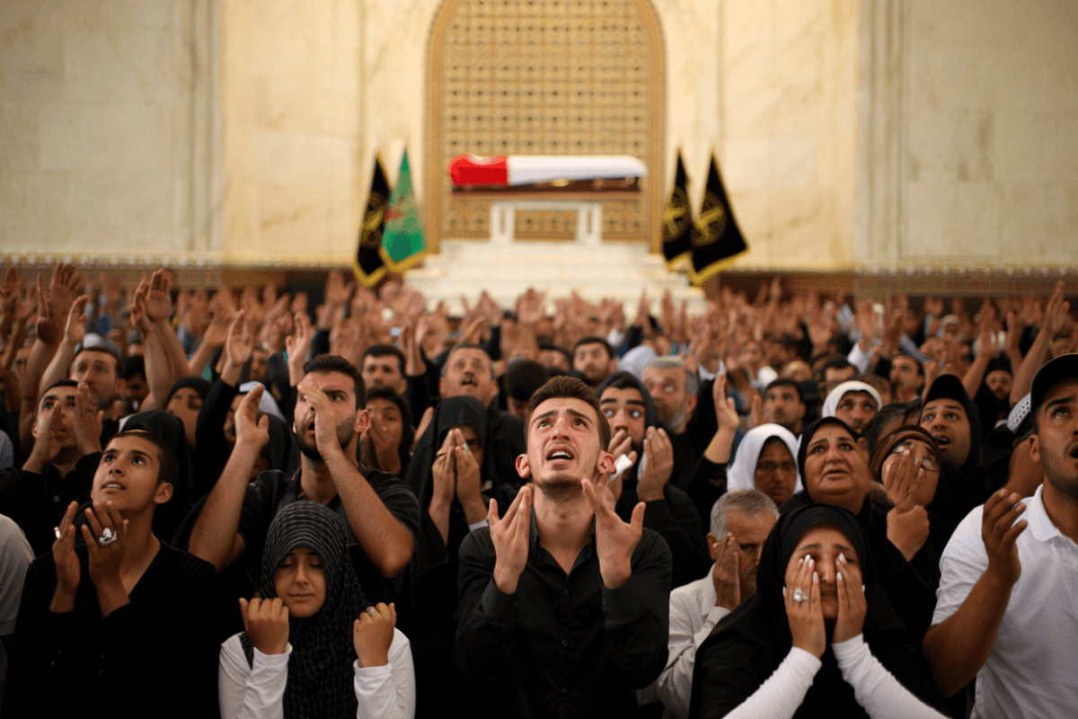 Iran begins funeral for slain supreme leader as peace talks pause