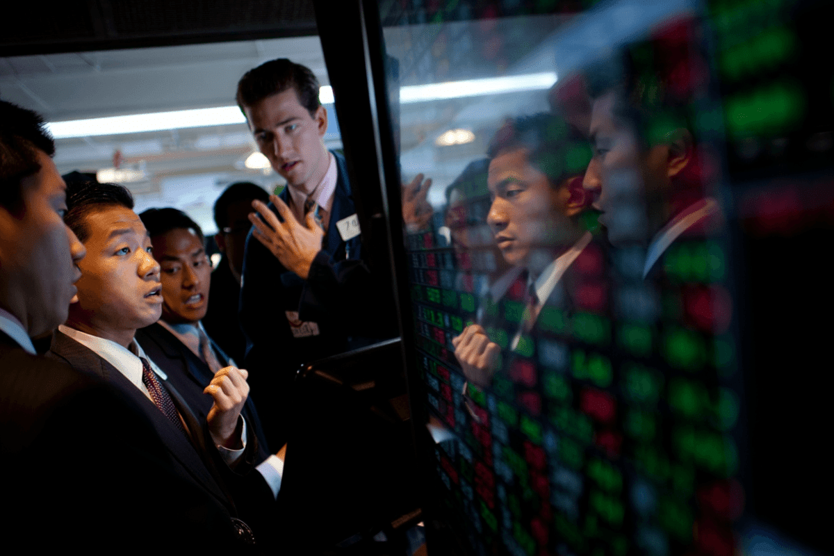 Investors navigate mixed signals as Fed holds rates steady, jobs data softens