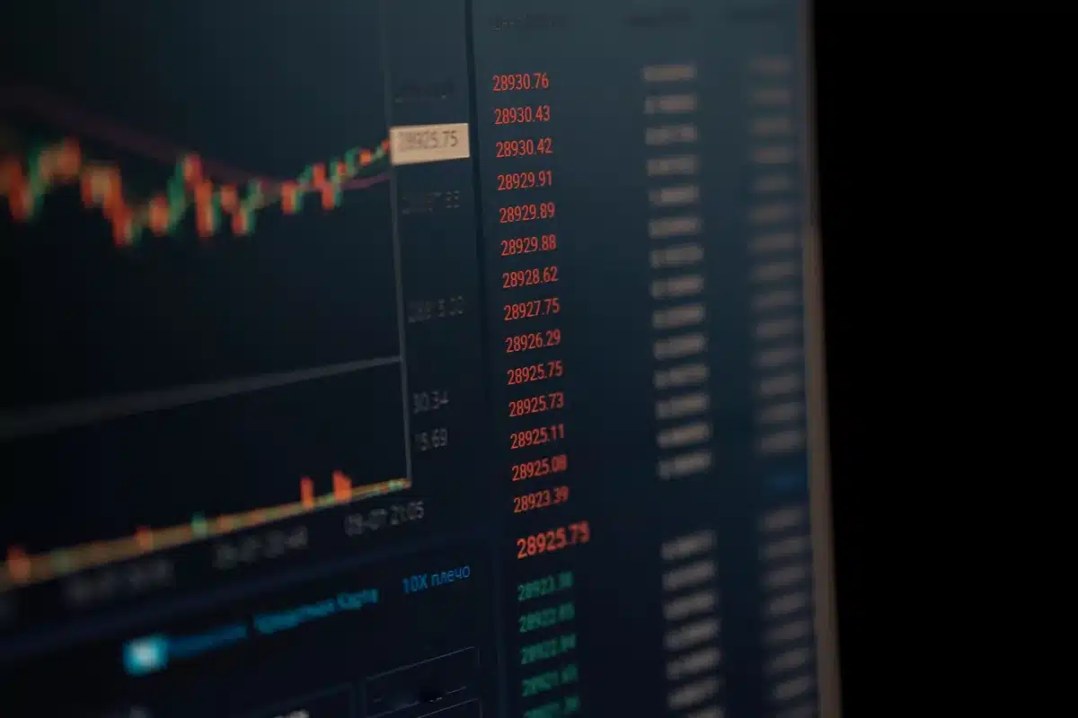 A glowing stock market ticker displaying soaring numbers and green candlesticks, abstract financial data streaming across a dark screen, representing rapid valuation growth and market momentum.