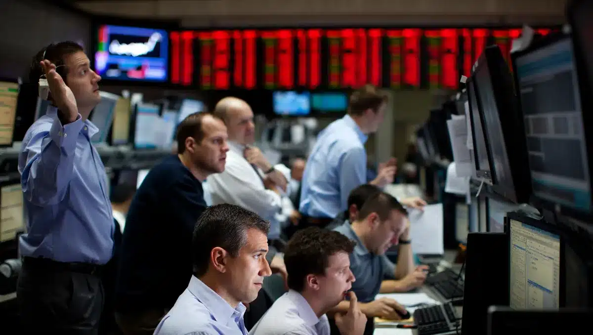 Dow drops 1,153 points as Fed holds rates steady with hawkish tone