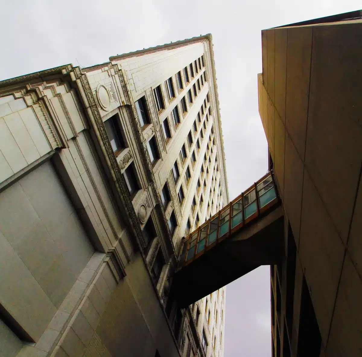 Federal Reserve building exterior with glass and steel architecture, official seal visible, formal and institutional setting