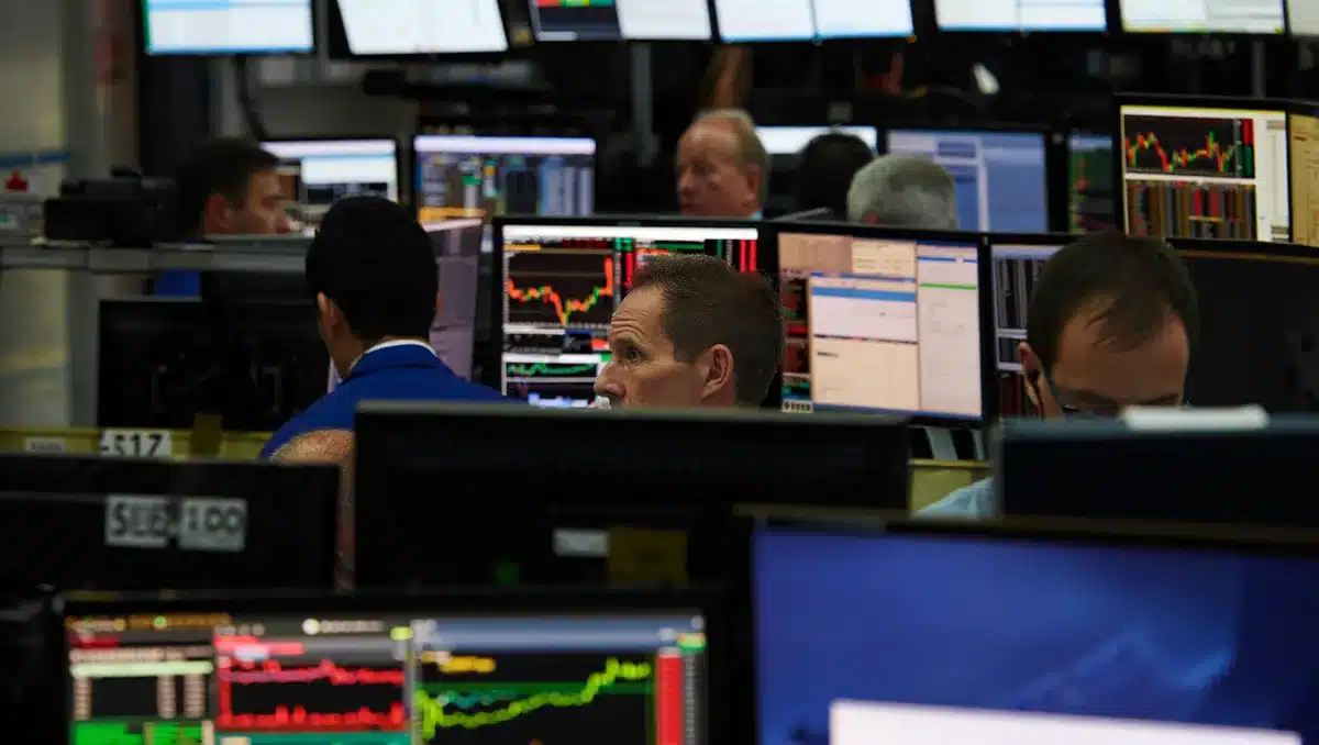 QQQ gains as Fed holds rates steady, three officials dissent