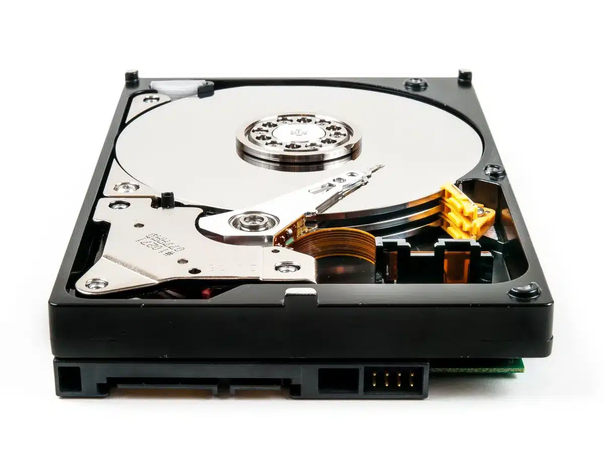 A Seagate hard drive component under magnification, showing intricate read-write head and platter detail, representing the advanced technology enabling massive storage capacity.