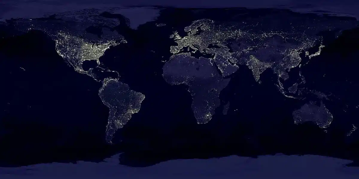 Multiple small satellites in orbit around Earth, solar panels extended, Earth curvature visible below
