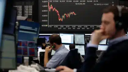 Stock market falls sharply as Fed holds rates steady, Nasdaq enters correction