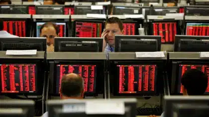 Stock market sinks after Fed holds rates; Nasdaq enters correction