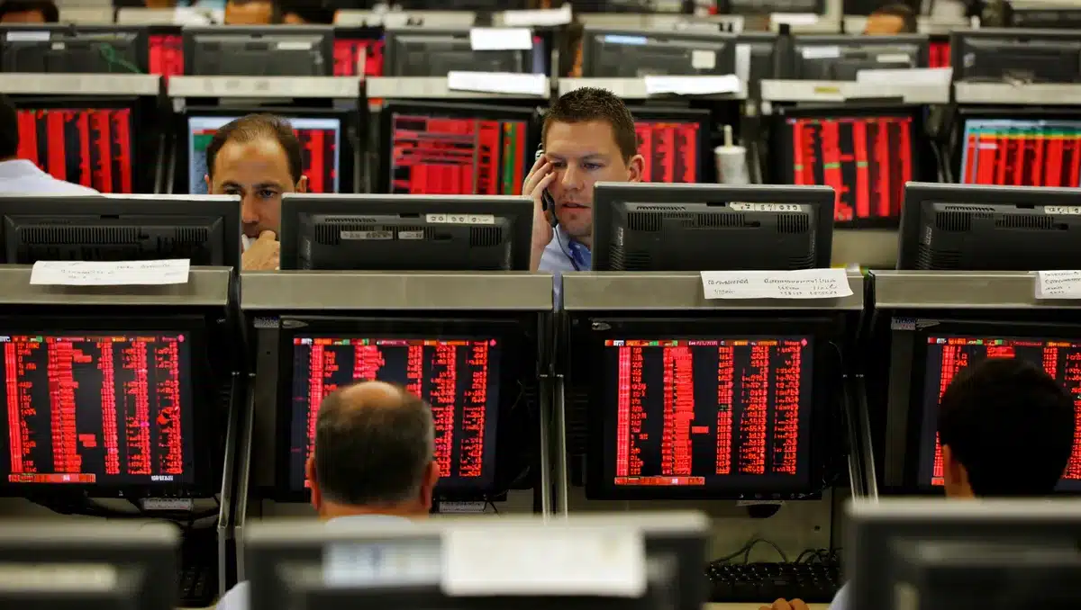 Stock market sinks after Fed holds rates; Nasdaq enters correction
