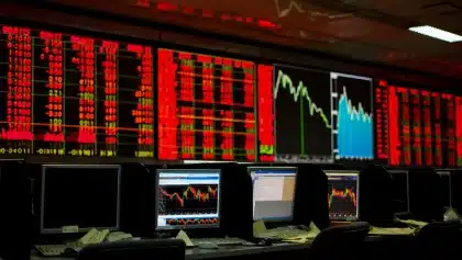 Stocks fall as oil surges past $100 on Middle East tensions
