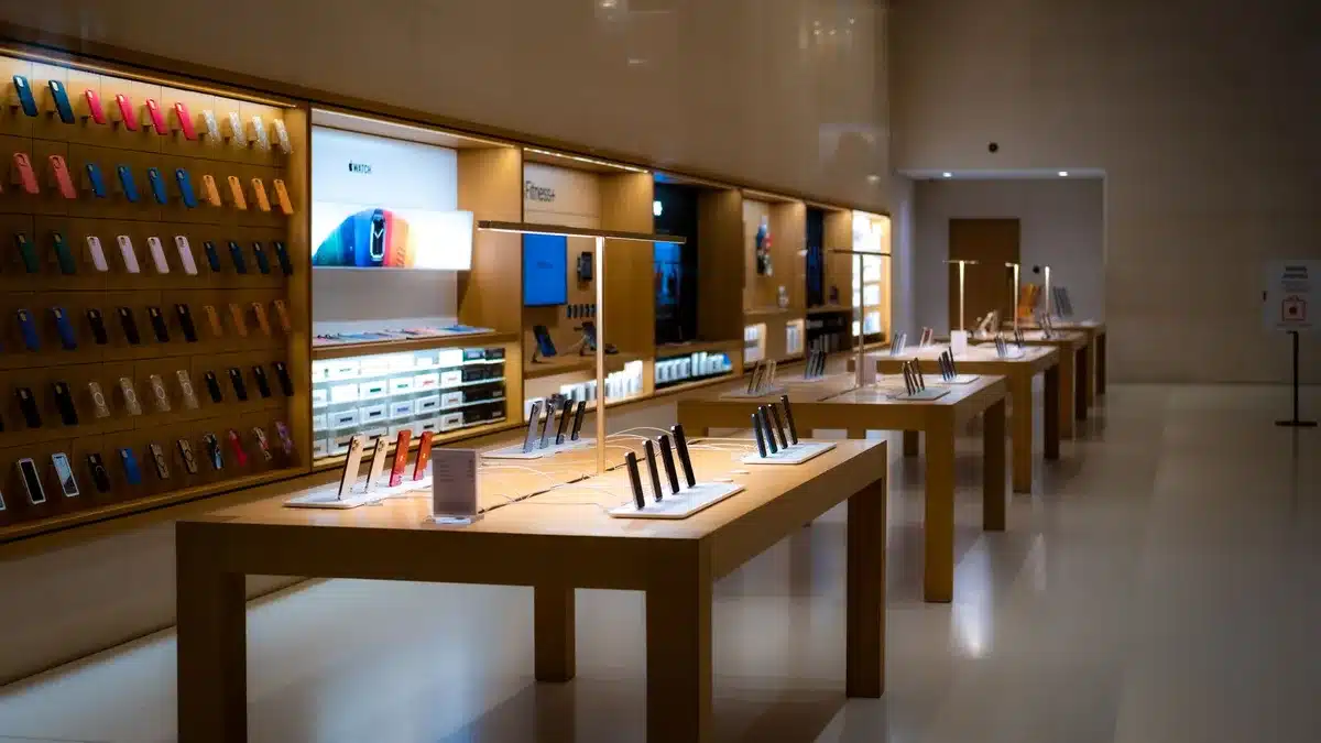 A beauty retail store interior with modern digital displays, personalization screens, and customers interacting with technology-enabled services, showing seamless omnichannel retail integration.