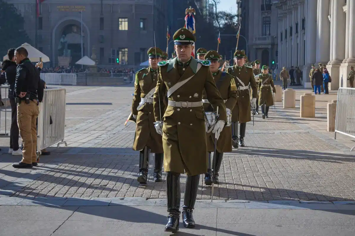 Inauguration ceremony with security personnel, flags, and international dignitaries gathered in an official outdoor venue.