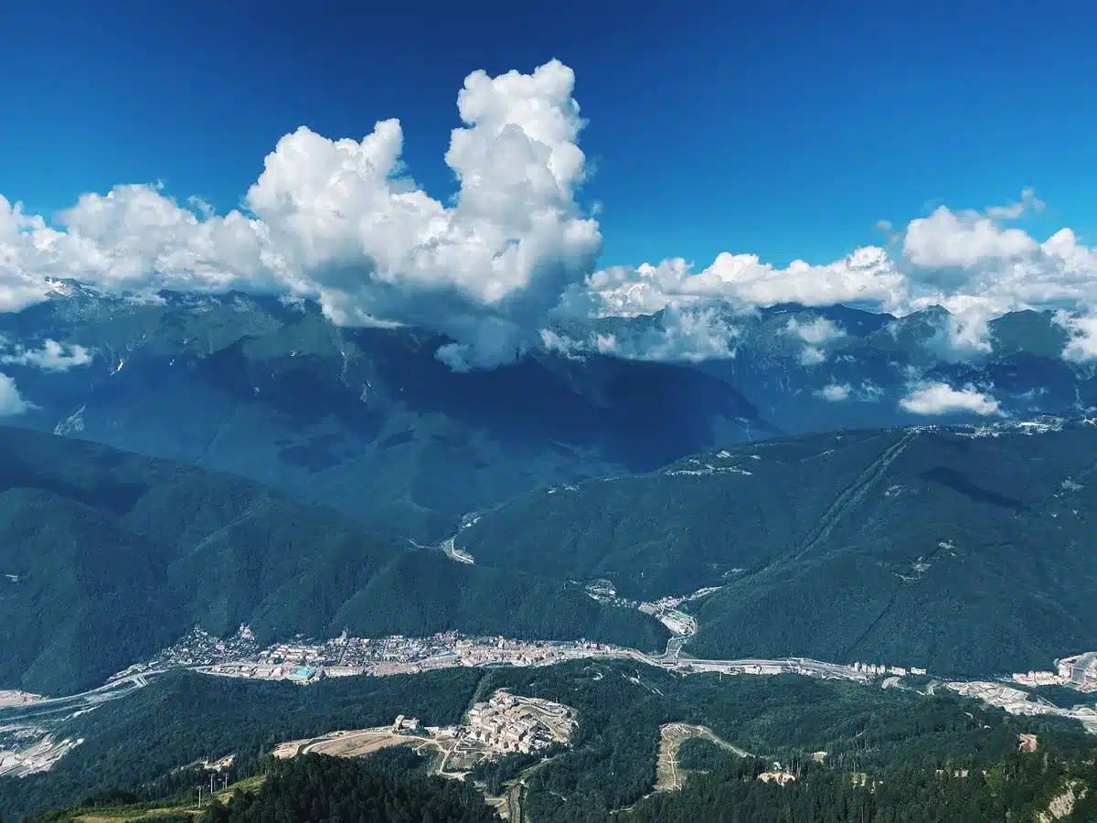 A split-screen representation of urban and rural landscapes, showing the geographic divide Amendment 4 addresses, with neutral tones emphasizing the geographic split without depicting real locations