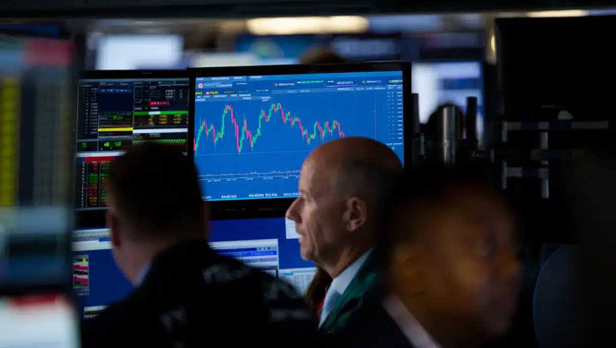 A stock market trading screen displaying live price charts and candlestick patterns in real-time, with multiple monitors showing financial data and market indices in a trading environment | stock market trading screen