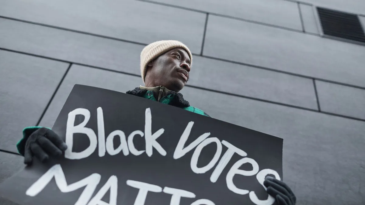 A split screen showing diverse young voters at a rally, some with raised fists, faces animated with passion, contrasted against an empty boardroom with a lone chair, representing generational shift in Democratic politics