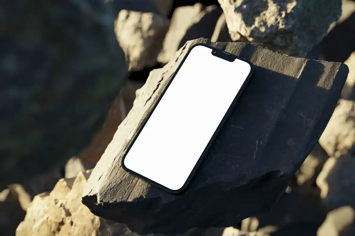 A glowing iPhone display showcasing the iPhone 17 series design, set against a blurred premium retail environment with soft spotlight illumination