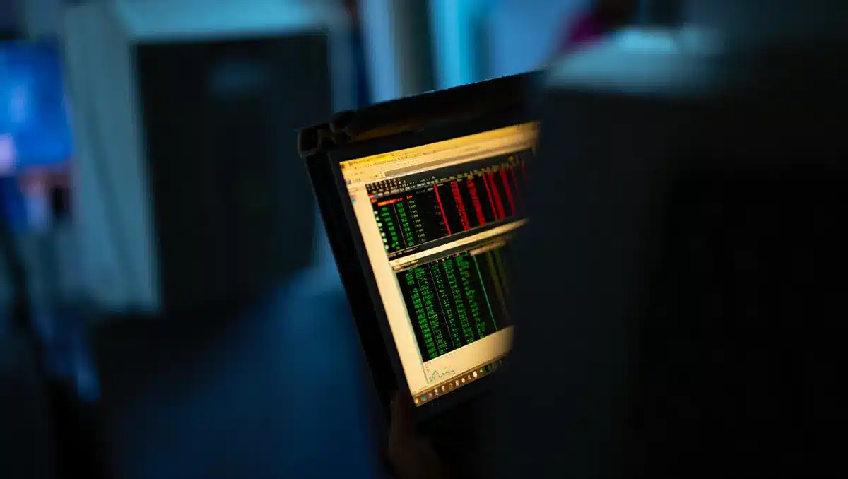 Stock market data displayed on a dark trading screen | stock market screen trading