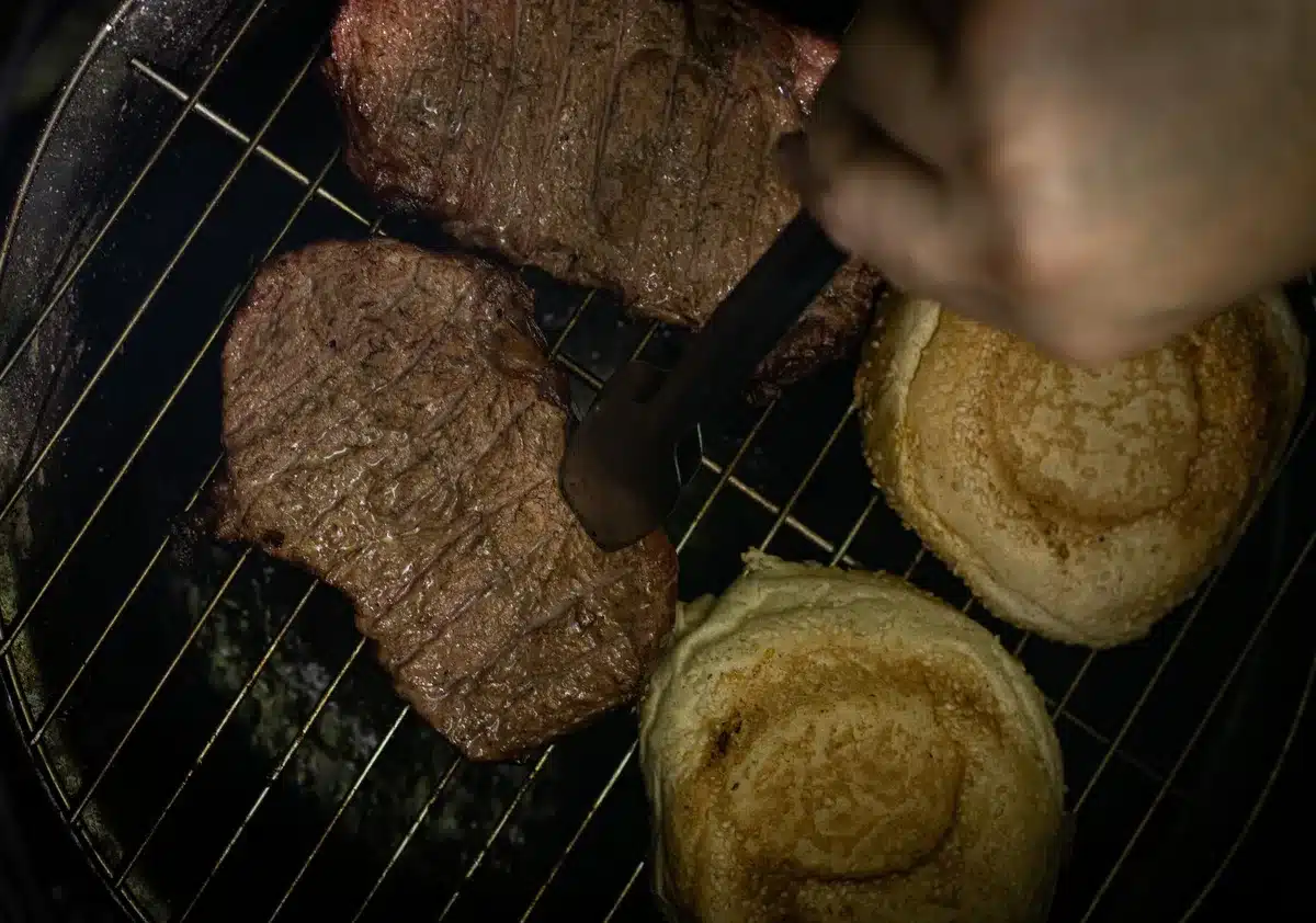 A close-up of a USDA inspection mark and establishment number on a beef product label, with "EST. 2025" clearly visible, showing the procedural documentation required for import verification