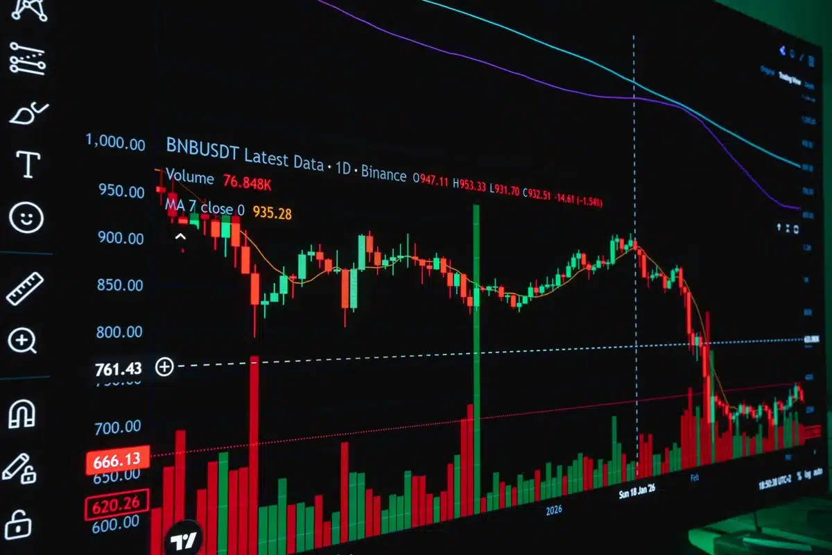 An empty Treasury bond trading pit with a single spotlight illuminating a trading terminal screen, papers scattered, dim ambient lighting, a sense of pause and intervention