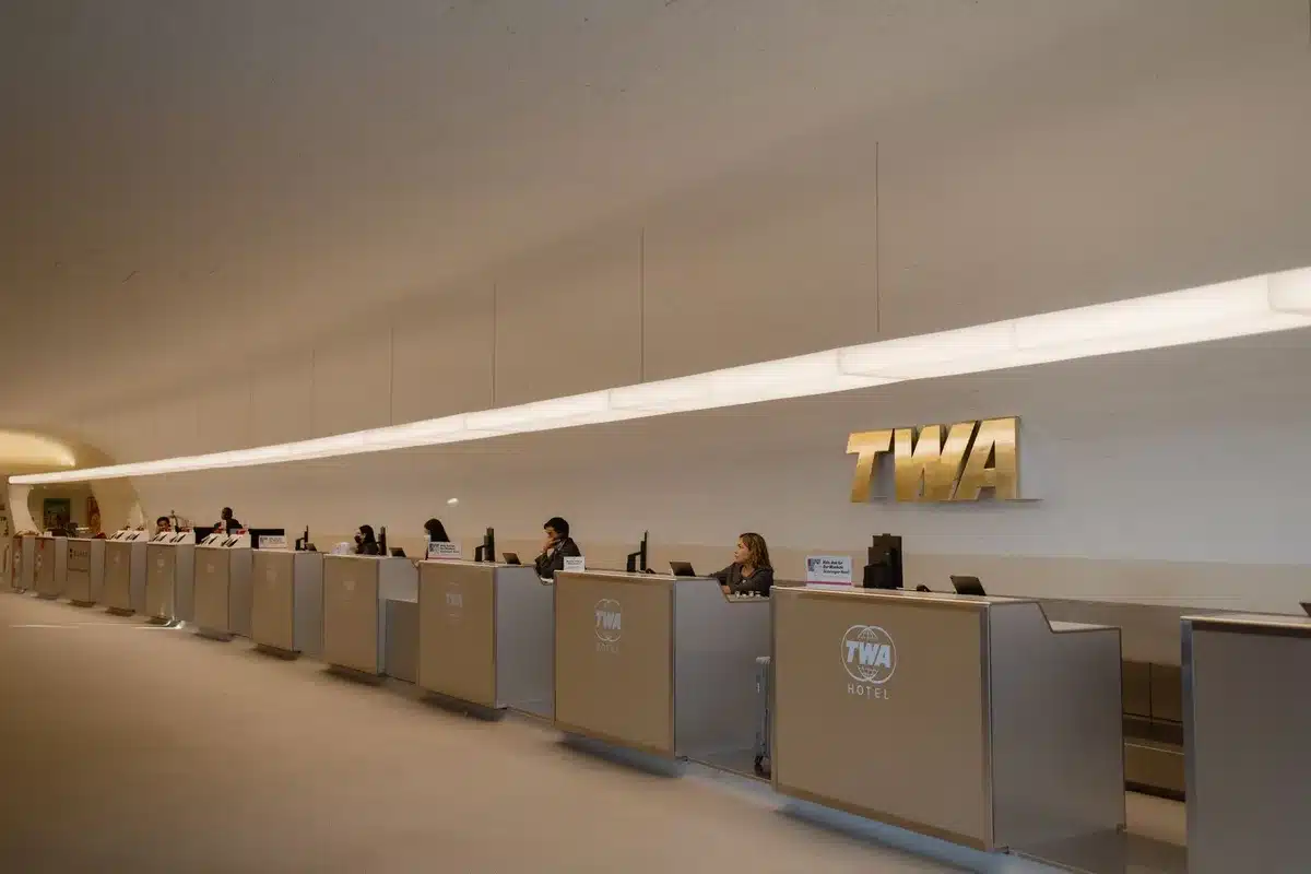 A split-screen showing the left side with traditional passport control lines crowded with people, right side with an empty modern biometric gate glowing softly, representing the transition from old to new