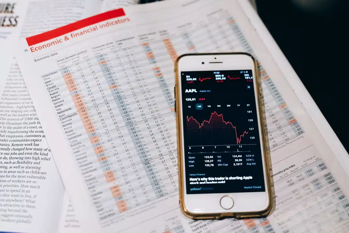 A portfolio tracking screen displaying stock tickers and position values, with data charts showing quarterly growth metrics and allocation percentages in a modern financial interface.