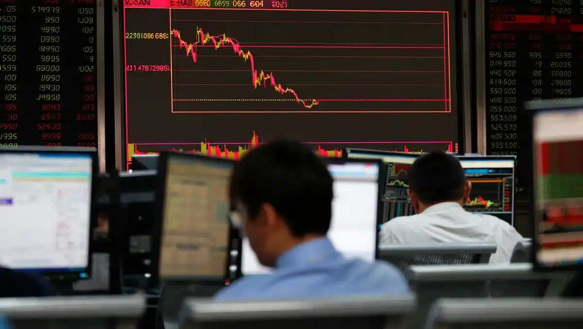 Stock market screen showing red decline indicators and financial charts | stock market decline trading