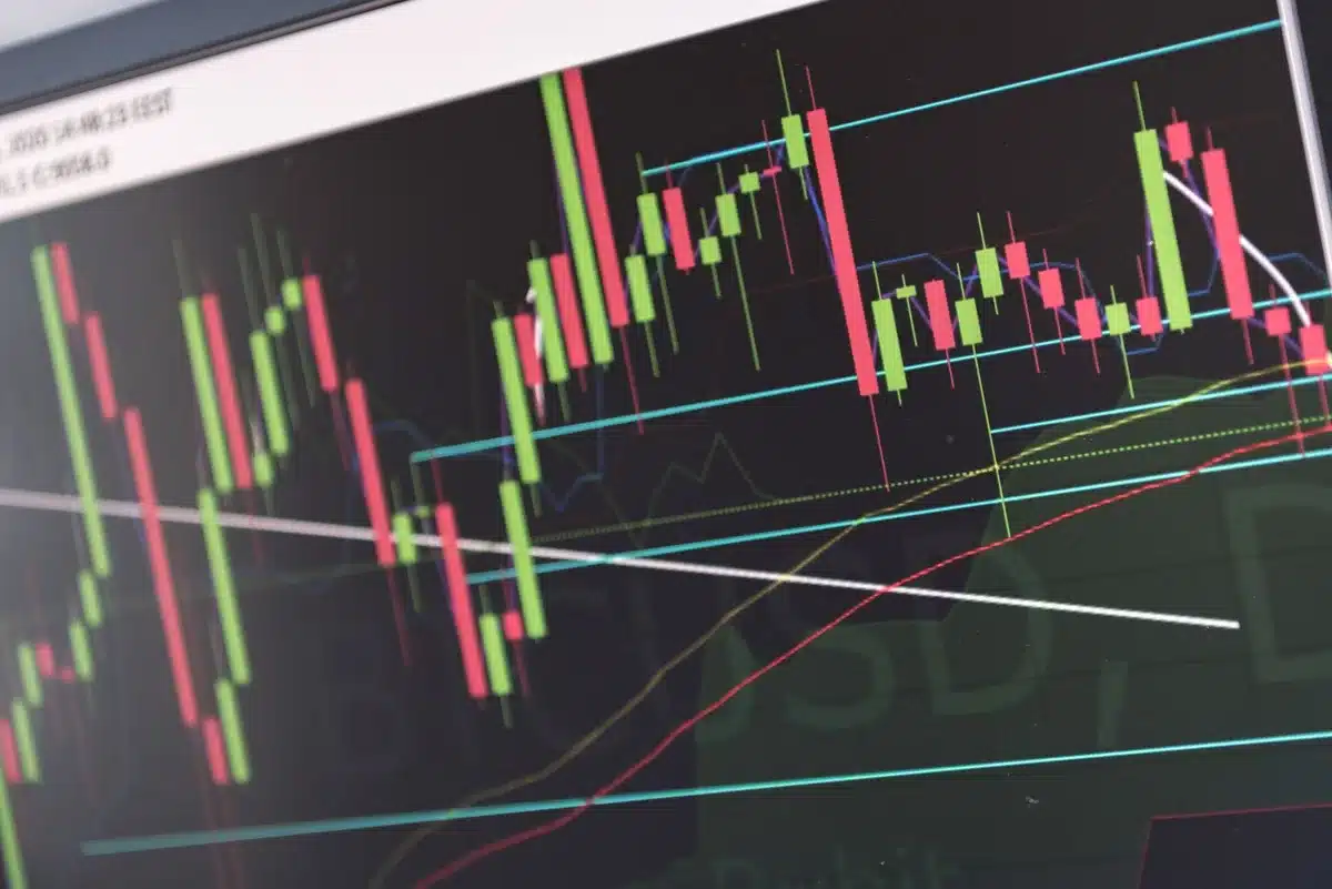 A stock market ticker display with CVS stock price highlighted, green upward arrow, digital numbers glowing on dark background, investor monitoring portfolio