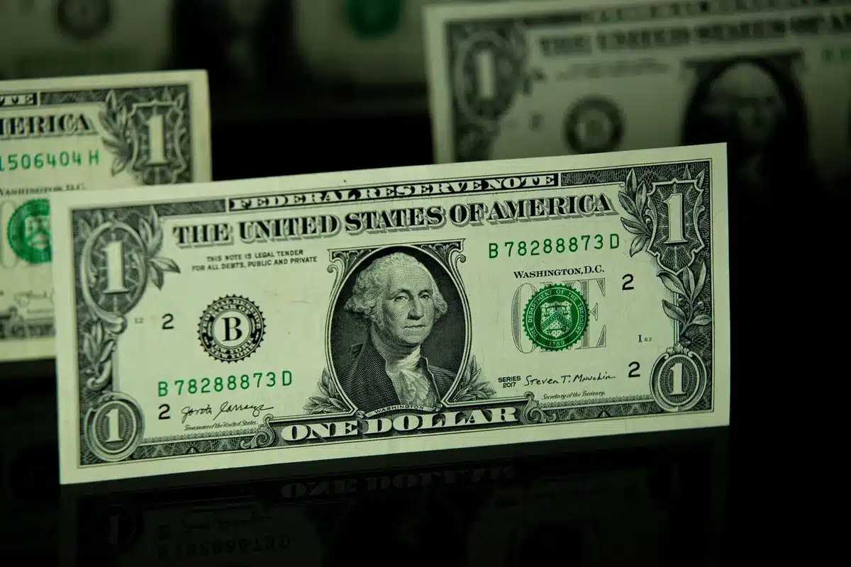 Dollar holds near 3-month lows as Treasury debt concerns weigh