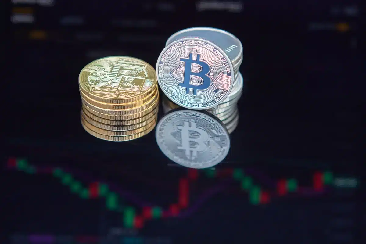 A sleek institutional trading floor with multiple screens displaying Bitcoin price charts and transaction data, soft blue and green lighting reflecting on glass surfaces, a single hand pointing at a rising candlestick chart, institutional traders in the background slightly blurred, focus on the data visualization