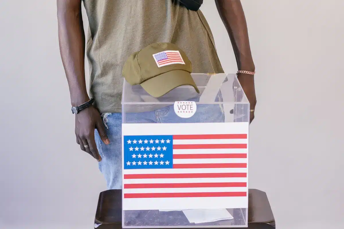 Democratic primary election scene with young voters casting ballots at a polling station, diverse crowd, early morning light, civic engagement