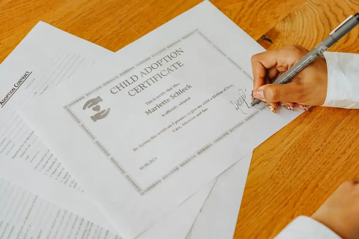 Petition signatures displayed on a government website, with numbers climbing past 100,000, symbolizing growing public disapproval of a diplomatic official.