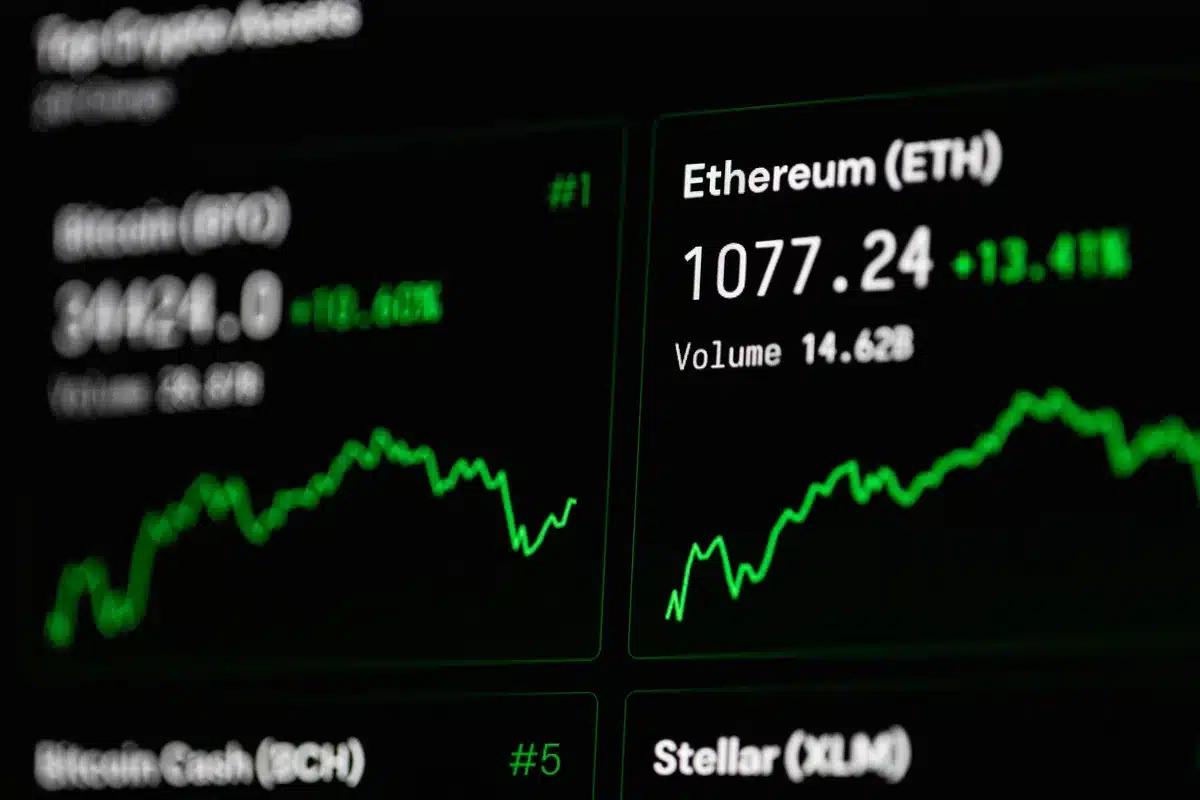 Stock market ticker displaying currency exchange rates and sanctions-related headlines; blue and red numbers on black screen