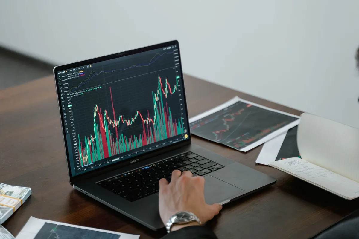 A stock market trading floor with glowing screens displaying green indices and falling oil price charts, traders in sharp focus watching monitors, bright overhead lights casting sharp shadows, a sense of cautious optimism