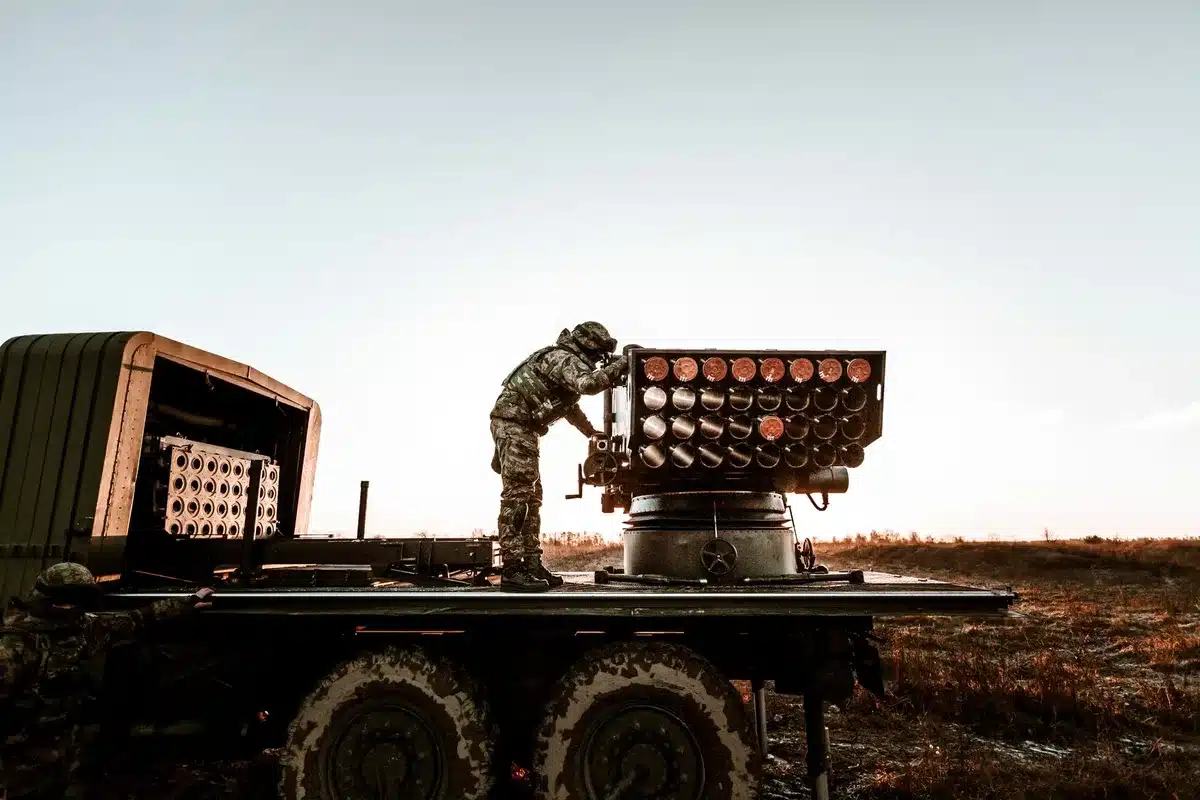 Anonymous military command center with tactical displays and glowing screens, urgent atmosphere, tension