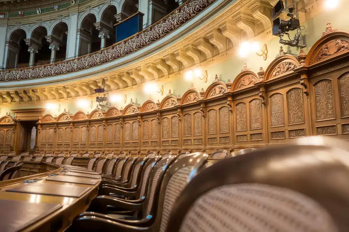 Capitol building interior with empty legislative chamber, soft ambient lighting, symbolic of House control and congressional power at stake.