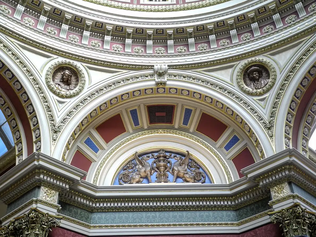 A crowded congressional chamber with representatives seated at desks, voting or debating, viewed from above or the gallery, showing the scale of the House