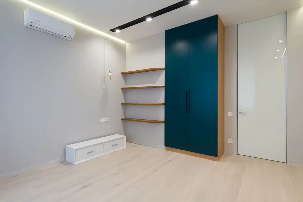 Close-up of InHalo air cleaning unit integrated into terminal wall design, showing the art-integrated approach, subtle lighting highlighting the device, modern minimalist aesthetic