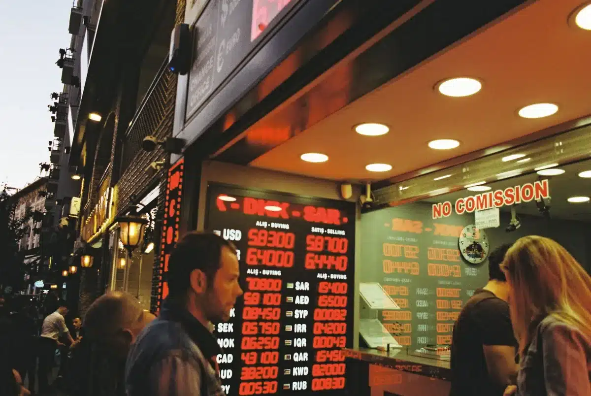 A close-up of a digital display showing mortgage rate percentages changing in real-time on a financial data terminal