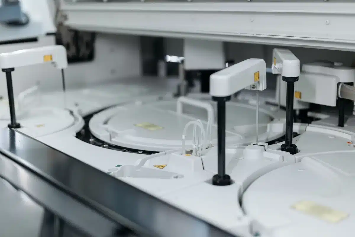 A university research laboratory with scientific equipment and data displays visible, representing institutional research partnerships and national security concerns in academic settings.