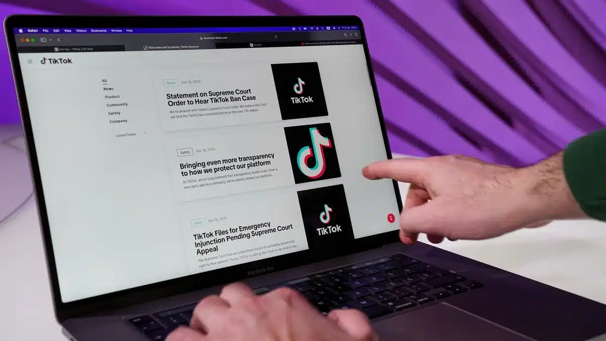 Laptop screen showing an e-commerce checkout interface with multiple browser tabs and affiliate tracking code visible in the background, representing the technical mechanism of cookie stuffing fraud.