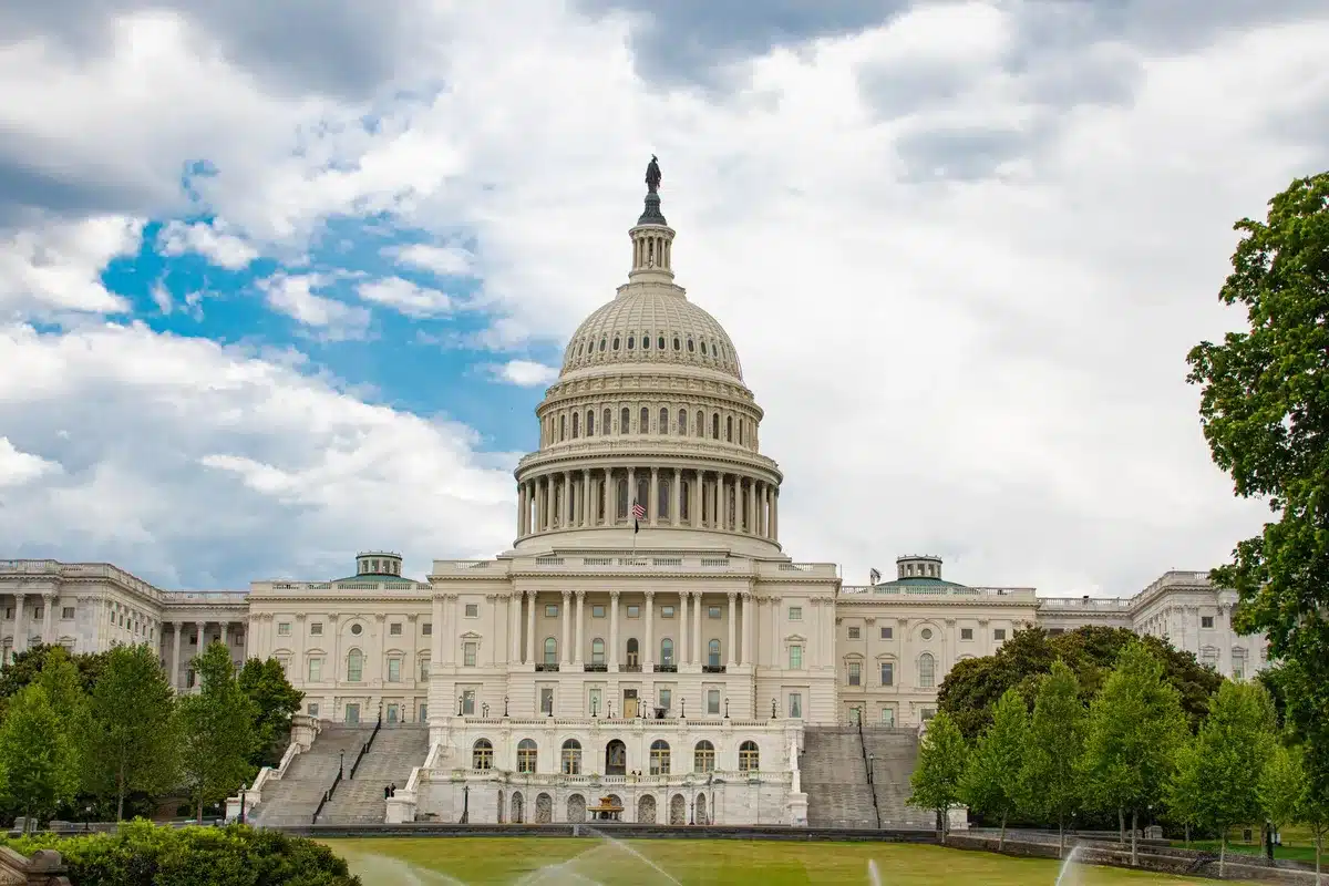 A closed door or darkened government building symbolizing legislative stalemate