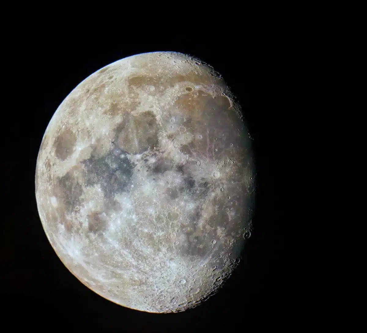 Observatory telescope pointed at night sky toward moon, dome open, equipment ready for observation, lunar disk visible