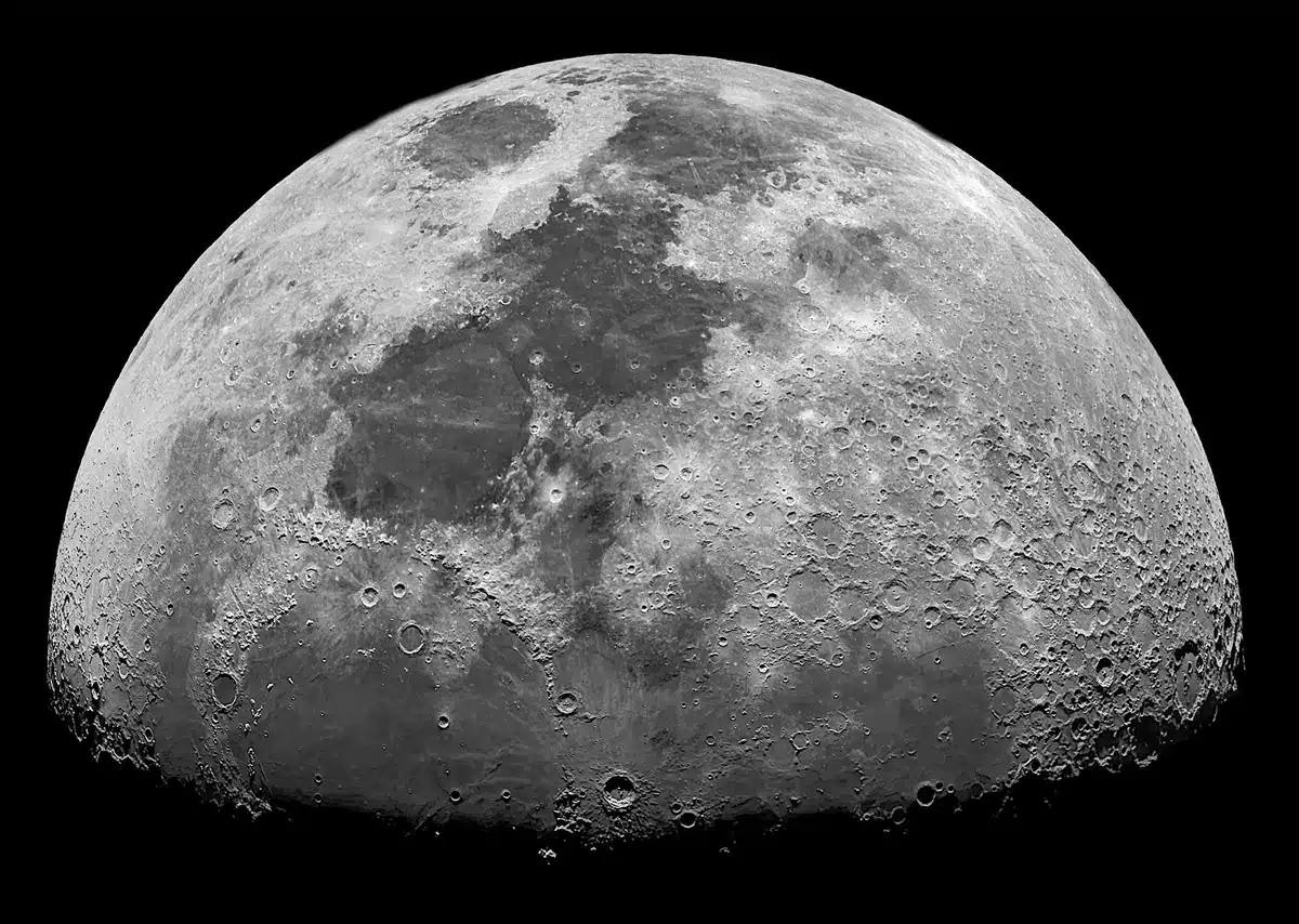 Scientists monitoring screens displaying orbital trajectories and impact coordinates, data streaming across multiple displays, a control room atmosphere with focused attention on lunar impact prediction data.
