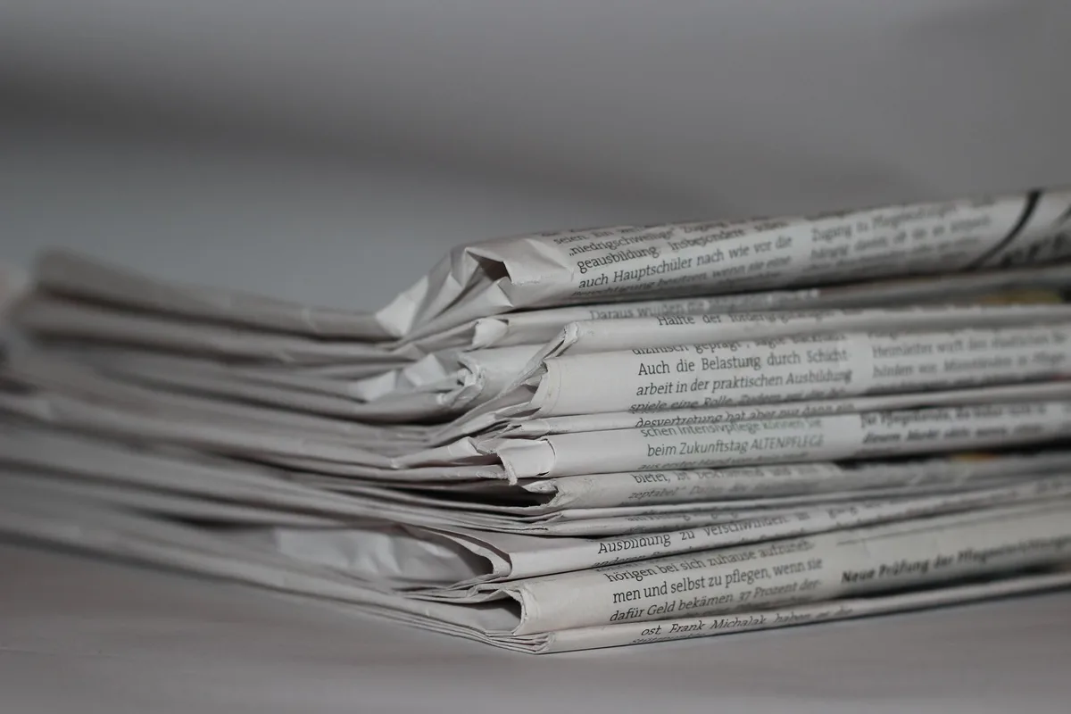 News coverage of military operations displayed on screens