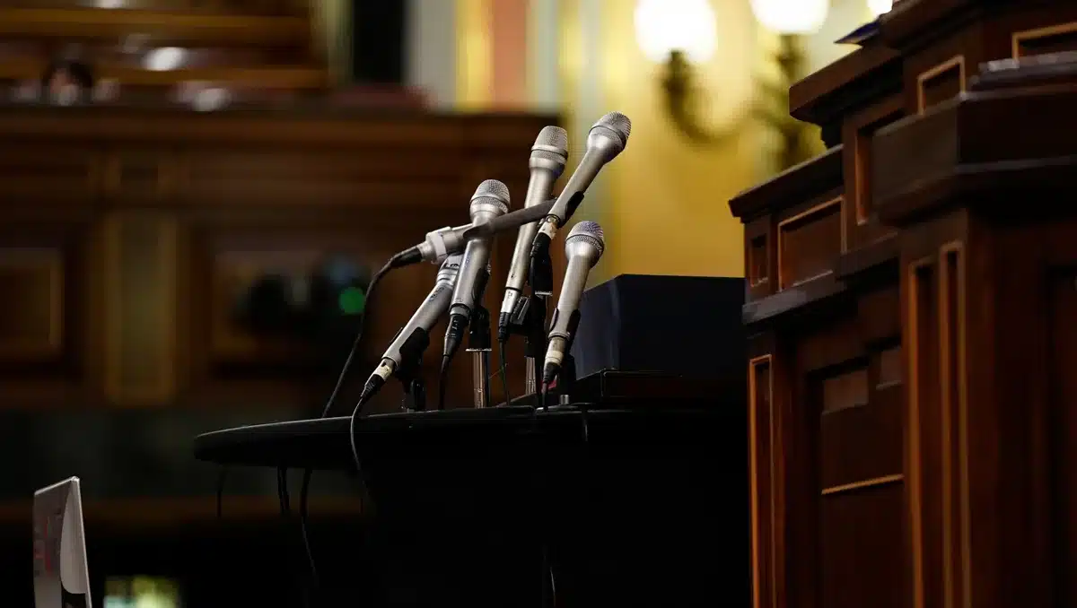 Podium with microphones in formal government setting | diplomatic negotiation podium