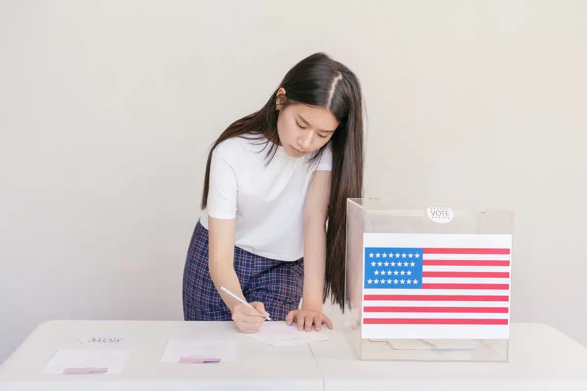 A Republican primary election ballot box with voting materials, emphasizing the democratic process and voter choice in a competitive primary contest.