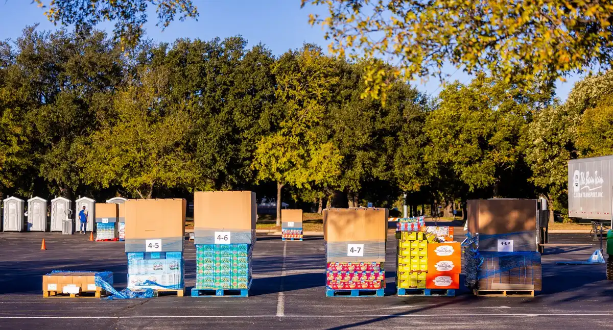 Stacked product boxes in warehouse with inventory labels