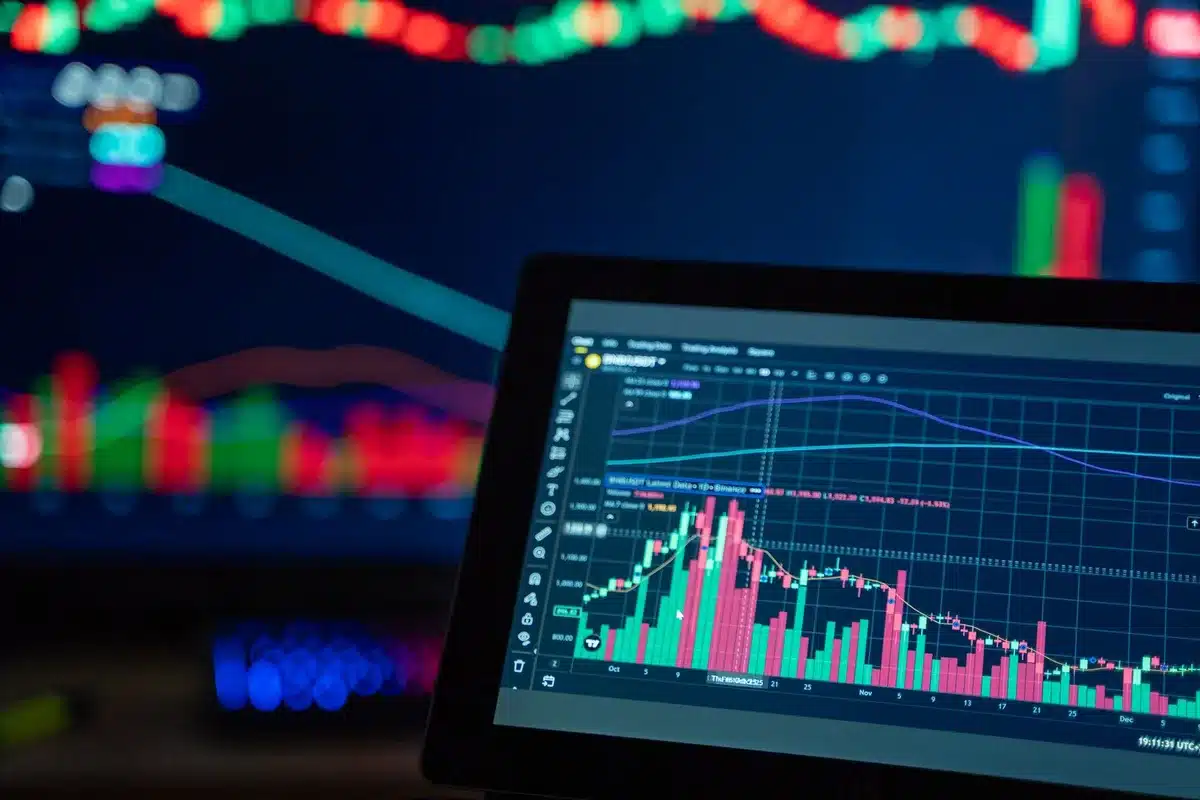 A digital price chart showing a cryptocurrency token hovering at a critical support level, with a horizontal line marking the $1 threshold, candlestick patterns showing consolidation, and subtle upward momentum indicators in cool blue tones against a dark background.