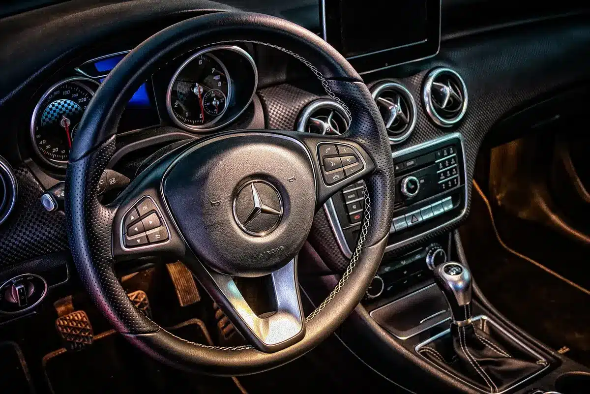 A sleek digital dashboard displaying real-time customer data, AI agent workflows, and performance metrics across multiple glowing screens in a dark tech environment
