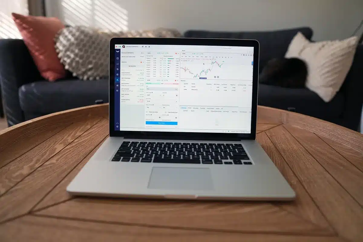 Stock trading screen showing Rocket Lab ticker symbol and declining price chart in red, candlestick patterns visible, financial data overlay, market volatility visualization
