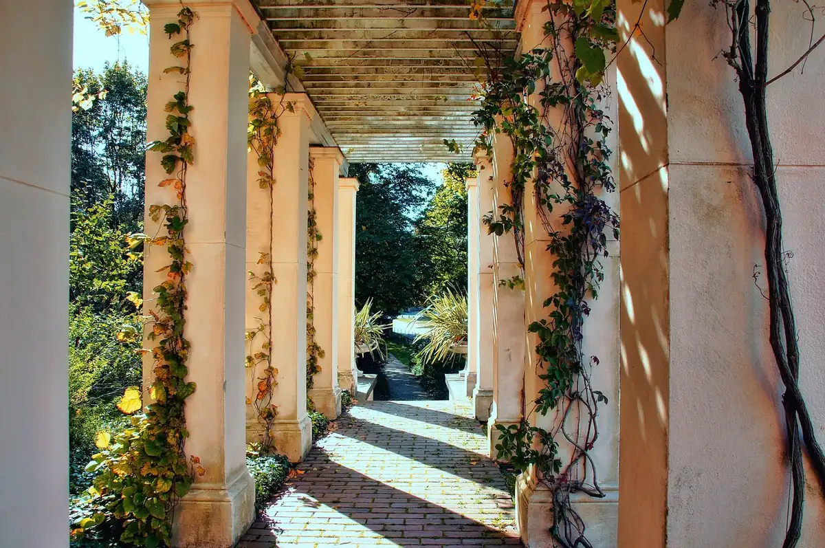 A split-screen scene showing a formal palace corridor on one side and a private residential street on the other, symbolizing the divide between official royal duty and private citizenship.